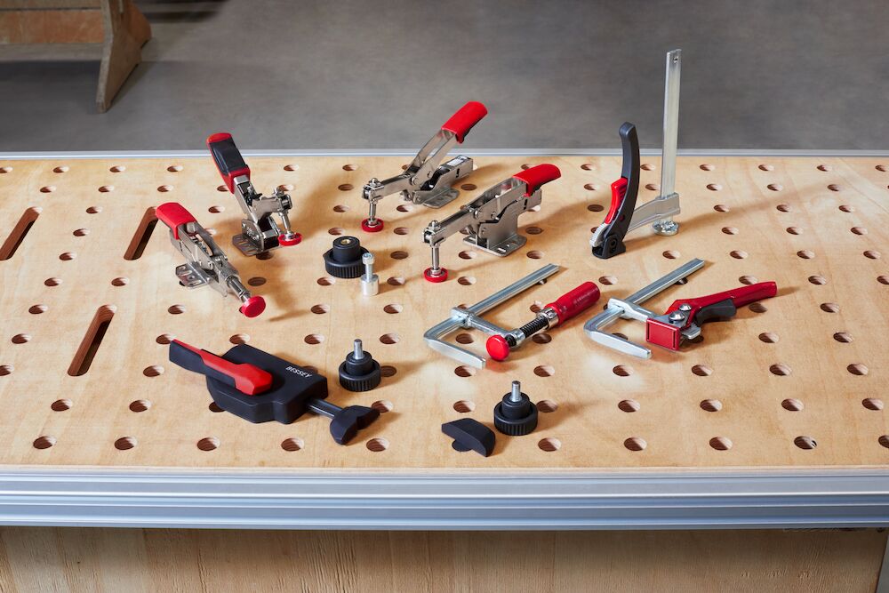 Clamping element for multifunctional tables with 20 mm hole diameter clamps a wooden slat onto the multifunctional table